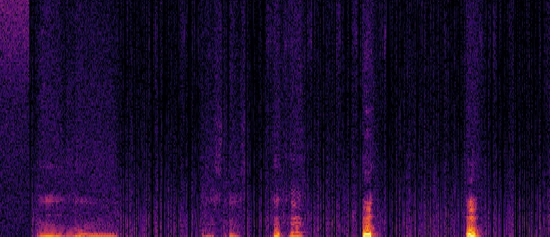 A close crop of an audio spectrogram, purple through orange